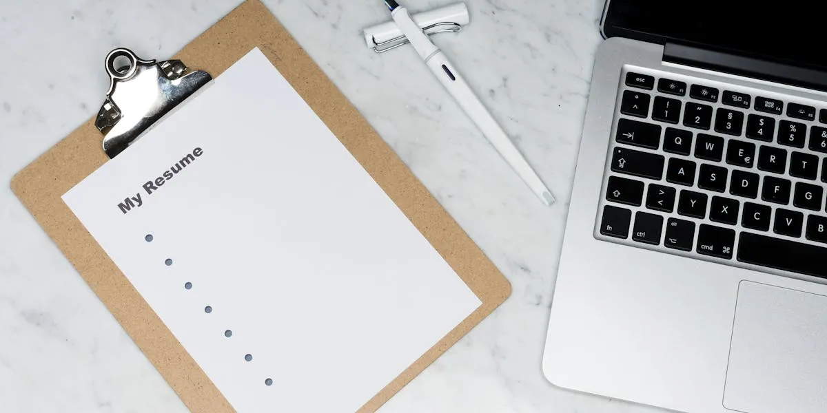 Resume and documents on a professional desk